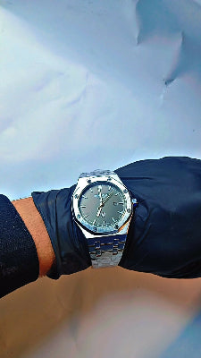 AUDEMARS PIGUET METAL CHAIN WATCH – BROWN DIAL & WHITE ACCENTS